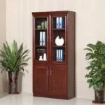 2 Door Executive Mahogany Cabinet – Elegant Storage for Modern Offices Enhance your workspace with the 2 Door Executive Mahogany Cabinet, a perfect blend of style, durability, and functionality. Crafted with a premium mahogany finish, this cabinet adds a warm, professional touch to any office while providing ample storage for files, documents, and office essentials. Its sturdy construction and lockable doors ensure long-lasting use and secure organization, making it ideal for executive offices and corporate environments. Key Features: 2 spacious lockable doors for secure document storage Premium mahogany finish for a classic executive look Ample internal shelving for organized file management Durable construction for long-term reliability Sleek, professional design suitable for offices and boardrooms