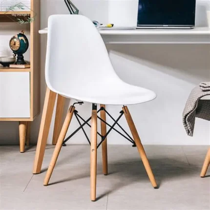white Eames plastic chair, Eames plastic chair, molded plastic chair, Eames style chair, modern plastic chair, designer dining chair, accent chair, kitchen chair, dining room chair, café chair, restaurant chair, office visitor chair, reception chair, guest chair, waiting room chair, side chair, armchair (Eames style), armless plastic chair, ergonomic molded chair, polypropylene chair, durable plastic chair, lightweight chair, stackable plastic chair, modern dining chair, contemporary chair, minimalist chair, Scandinavian style chair, stylish plastic chair, elegant modern chair, home furniture chair, residential chair, indoor chair, multipurpose chair, functional seating chair, practical chair, simple design chair, modern interior chair, decorative chair, living room accent chair, kitchen seating chair, office lounge chair, hospitality seating chair, commercial chair, event chair, wedding chair, banquet chair, student chair, study chair, workspace visitor chair, office furniture chair, modern workspace seating, office setup furniture, home office furniture, contemporary furniture piece, molded seat chair, fiberglass style chair, metal leg chair, wooden leg chair, Eiffel base chair, cross base chair, sturdy plastic chair, reinforced chair, stable chair, comfortable seating chair, white plastic chair, white dining chair, white accent chair, white office chair, white Eames plastic chair Kenya, Eames chair Nairobi, plastic chair Kenya, dining chair Kenya, office visitor chair Kenya, modern chair Kenya, home furniture Kenya, office furniture Kenya, café chair Kenya, restaurant chair Kenya, stylish chair Kenya, durable chair Kenya, lightweight chair Kenya, stackable chair Kenya, contemporary furniture Kenya, minimalist furniture Kenya, modern furniture Kenya, residential furniture Kenya, commercial furniture Kenya, hospitality furniture Kenya, office seating Kenya, reception chair Kenya, guest chair Kenya, waiting chair Kenya, kitchen chair Kenya, dining furniture Kenya, Nairobi furniture Kenya.