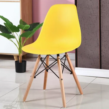 Yellow Plastic Eames Chair, Eames Chair Kenya, Yellow Dining Chair, Plastic Eames Chair Kenya, Modern Dining Chair, Scandinavian Chair Kenya, Polypropylene Dining Chair, Café Chair Kenya, Restaurant Chair, Office Visitor Chair, Accent Chair Kenya, Contemporary Dining Chair, Home Dining Furniture, Study Chair Kenya, Modern Plastic Chair, Designer Chair Kenya, Commercial Seating, Dining Furniture Kenya, Home Furniture Kenya, Tamco Furniture Kenya