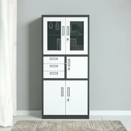 Half Glass Cabinet With Safe  The Half Glass Cabinet With Safe is a multifunctional office storage solution that combines secure document storage with a convenient display area. Designed for offices, schools, hospitals, government institutions, banks, and commercial businesses, this cabinet features an upper section with glass doors for easy visibility and a lower compartment with an integrated safe for protecting confidential documents, cash, keys, and other valuables. Manufactured from heavy-duty steel with a durable powder-coated finish, this cabinet offers exceptional strength, security, and long-lasting performance. Adjustable shelves provide flexible organization, while the lockable safe ensures enhanced protection for important assets. Key Features Half glass and half steel cabinet design Integrated lockable safe for valuables Heavy-duty steel construction Transparent tempered glass upper doors Adjustable steel shelves Secure central locking system Reinforced steel safe compartment Durable powder-coated finish Scratch-, rust-, and corrosion-resistant surface Spacious storage for files, books, documents, and office supplies Professional design for commercial and institutional use Specifications Product Type: Half Glass Cabinet With Safe Material: Heavy-Duty Steel and Tempered Glass Upper Section: Glass Display Cabinet Lower Section: Steel Cabinet with Integrated Safe Doors: 2 Glass Doors and 2 Steel Doors Shelves: Adjustable Steel Shelves Locking System: Central Key Lock and Separate Safe Lock Finish: Powder-Coated Metallic Finish Colour: Grey, Black, Beige, White, or Custom Colours Application: Office, School, Hospital, Bank, Government Office, Institution, Business Assembly: Fully assembled Benefits Dual-purpose storage: Combines visible storage for frequently accessed items with a secure safe for valuables. Enhanced security: The integrated safe provides added protection for confidential documents, cash, and important items. Flexible organization: Adjustable shelves accommodate files, binders, books, and office supplies of various sizes. Durable construction: Heavy-duty steel body ensures long-lasting reliability in busy workplaces. Professional appearance: Modern steel and glass design enhances the look of executive and commercial office spaces.