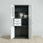 Half Glass Cabinet With Safe  The Half Glass Cabinet With Safe is a multifunctional office storage solution that combines secure document storage with a convenient display area. Designed for offices, schools, hospitals, government institutions, banks, and commercial businesses, this cabinet features an upper section with glass doors for easy visibility and a lower compartment with an integrated safe for protecting confidential documents, cash, keys, and other valuables. Manufactured from heavy-duty steel with a durable powder-coated finish, this cabinet offers exceptional strength, security, and long-lasting performance. Adjustable shelves provide flexible organization, while the lockable safe ensures enhanced protection for important assets. Key Features Half glass and half steel cabinet design Integrated lockable safe for valuables Heavy-duty steel construction Transparent tempered glass upper doors Adjustable steel shelves Secure central locking system Reinforced steel safe compartment Durable powder-coated finish Scratch-, rust-, and corrosion-resistant surface Spacious storage for files, books, documents, and office supplies Professional design for commercial and institutional use Specifications Product Type: Half Glass Cabinet With Safe Material: Heavy-Duty Steel and Tempered Glass Upper Section: Glass Display Cabinet Lower Section: Steel Cabinet with Integrated Safe Doors: 2 Glass Doors and 2 Steel Doors Shelves: Adjustable Steel Shelves Locking System: Central Key Lock and Separate Safe Lock Finish: Powder-Coated Metallic Finish Colour: Grey, Black, Beige, White, or Custom Colours Application: Office, School, Hospital, Bank, Government Office, Institution, Business Assembly: Fully assembled Benefits Dual-purpose storage: Combines visible storage for frequently accessed items with a secure safe for valuables. Enhanced security: The integrated safe provides added protection for confidential documents, cash, and important items. Flexible organization: Adjustable shelves accommodate files, binders, books, and office supplies of various sizes. Durable construction: Heavy-duty steel body ensures long-lasting reliability in busy workplaces. Professional appearance: Modern steel and glass design enhances the look of executive and commercial office spaces.