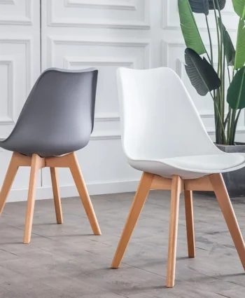 padded wooden base Eames chair, Eames chair with padded seat, padded wooden Eames chair, Eames style wooden chair, modern padded chair, wooden base chair, designer Eames chair, comfortable lounge chair, mid century modern chair, contemporary wooden chair, stylish home chair, premium furniture, modern furniture, luxury furniture, living room chair, dining chair, office chair, home decor, interior furniture, Eames chair Kenya, Eames chair Nairobi, padded chairs Nairobi, wooden chairs Nairobi, modern furniture Nairobi, designer furniture Nairobi, luxury furniture Nairobi, furniture Kenya, furniture Nairobi, home decor Kenya, interior design Nairobi, furniture shop Nairobi, furniture store Kenya, contemporary furniture Kenya, wooden base furniture Kenya