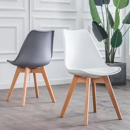 padded wooden base Eames chair, Eames chair with padded seat, padded wooden Eames chair, Eames style wooden chair, modern padded chair, wooden base chair, designer Eames chair, comfortable lounge chair, mid century modern chair, contemporary wooden chair, stylish home chair, premium furniture, modern furniture, luxury furniture, living room chair, dining chair, office chair, home decor, interior furniture, Eames chair Kenya, Eames chair Nairobi, padded chairs Nairobi, wooden chairs Nairobi, modern furniture Nairobi, designer furniture Nairobi, luxury furniture Nairobi, furniture Kenya, furniture Nairobi, home decor Kenya, interior design Nairobi, furniture shop Nairobi, furniture store Kenya, contemporary furniture Kenya, wooden base furniture Kenya