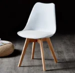 padded wooden base Eames chair, Eames chair with padded seat, padded wooden Eames chair, Eames style wooden chair, modern padded chair, wooden base chair, designer Eames chair, comfortable lounge chair, mid century modern chair, contemporary wooden chair, stylish home chair, premium furniture, modern furniture, luxury furniture, living room chair, dining chair, office chair, home decor, interior furniture, Eames chair Kenya, Eames chair Nairobi, padded chairs Nairobi, wooden chairs Nairobi, modern furniture Nairobi, designer furniture Nairobi, luxury furniture Nairobi, furniture Kenya, furniture Nairobi, home decor Kenya, interior design Nairobi, furniture shop Nairobi, furniture store Kenya, contemporary furniture Kenya, wooden base furniture Kenya
