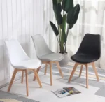 padded wooden base Eames chair, Eames chair with padded seat, padded wooden Eames chair, Eames style wooden chair, modern padded chair, wooden base chair, designer Eames chair, comfortable lounge chair, mid century modern chair, contemporary wooden chair, stylish home chair, premium furniture, modern furniture, luxury furniture, living room chair, dining chair, office chair, home decor, interior furniture, Eames chair Kenya, Eames chair Nairobi, padded chairs Nairobi, wooden chairs Nairobi, modern furniture Nairobi, designer furniture Nairobi, luxury furniture Nairobi, furniture Kenya, furniture Nairobi, home decor Kenya, interior design Nairobi, furniture shop Nairobi, furniture store Kenya, contemporary furniture Kenya, wooden base furniture Kenya