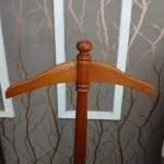 Mahogany Executive Coat Hanger Stand, premium mahogany coat stand, executive wooden coat hanger, elegant office coat rack, luxury wooden coat stand, freestanding coat hanger stand, polished mahogany clothing rack, professional office accessories, executive office coat rack, high-quality wooden coat stand, durable mahogany coat hanger, classic wooden garment stand, premium office furniture accessories, stylish coat storage solution, wooden jacket hanger stand, freestanding garment rack, business office coat stand, modern executive coat rack, elegant wooden clothing organizer, professional reception coat stand, luxury corporate office accessories, mahogany suit hanger stand, office jacket storage stand, wooden hat and coat stand, space-saving coat rack, sophisticated office furnishing, natural wood coat hanger, polished wooden garment organizer, executive lobby coat stand, premium business furniture accessories, durable freestanding coat rack, office visitor coat hanger, stylish wooden coat organizer, executive wardrobe accessory, professional garment storage furniture, classic mahogany office accessory, elegant suit and jacket stand, commercial office coat rack, wooden clothes hanging stand, high-end executive furniture accessory, premium mahogany furniture, office entrance coat stand, visitor coat storage solution, contemporary wooden coat rack, practical office organization accessory, executive workspace furniture, luxury reception furniture accessory, durable wooden coat hanger stand, professional office interior accessory, mahogany garment hanging rack, Executive office, CEO office, managing director's office, manager's office, corporate office, private office, home office, office reception area, corporate reception, business lobby, boardroom, conference room, meeting room, executive suite, corporate headquarters, administrative office, law firm office, accounting office, financial services office, consulting firm office, real estate office, insurance company office, government office, public administration building, university administration office, school principal's office, hospital administration office, hotel reception, hotel lobby, conference center, commercial office building, coworking space, business center, client consultation room, executive waiting area, office entrance, reception lobby, professional workspace, home study, residential entrance hall, living room, guest room, luxury apartment, corporate guest room, executive meeting area, showroom, office furniture showroom, commercial premises, Nairobi corporate offices, Nairobi business district, Kenyan executive offices, office furniture suppliers in Kenya, professional workplaces across Kenya, corporate interiors in East Africa.