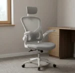 Gray Ergonomic Mesh Office Chair with Flip Armrest is a modern, comfortable, durable, and practical seating solution designed for offices, home workspaces, executive workstations, reception areas, meeting rooms, training rooms, study rooms, call centres, computer labs, coworking spaces, and professional work environments, featuring a breathable mesh backrest that promotes airflow and helps keep the user comfortable during long working hours, the ergonomic design provides supportive seating for daily office tasks such as computer work, typing, reading, meetings, online classes, and administrative duties, while the gray finish gives the chair a professional and contemporary appearance that blends easily with modern office interiors and different desk styles, the flip armrests provide added flexibility by allowing the armrests to be raised when not required, making it easier to move closer to the desk, position the chair under a workstation, or create additional space when the chair is not in use, the practical design makes this chair suitable for employees, managers, students, professionals, and home-office users who require comfortable and adaptable seating, the breathable mesh back helps provide ventilation while the supportive seat is designed for everyday use, making it a suitable choice for busy offices and workspaces, its versatile appearance allows it to complement office desks, computer tables, reception furniture, conference tables, workstations, and other commercial furniture, ideal for businesses looking to improve workplace comfort and productivity while maintaining a clean and professional office appearance, the chair can be used in corporate offices, small businesses, home offices, educational institutions, training centres, technology companies, customer service centres, shared workspaces, libraries, study areas, and administrative departments, Gray ergonomic office chair, gray mesh office chair, ergonomic mesh chair, office chair with flip armrest, mesh office chair, adjustable office chair, comfortable office chair, modern office chair, computer chair, workstation chair, desk chair, professional office chair, breathable mesh chair, flip armrest chair, office seating, ergonomic office furniture, commercial office chair, home office chair, study chair, computer workstation chair, employee office chair, staff chair, meeting room chair, training room chair, coworking chair, reception office chair, corporate office furniture, modern office furniture, comfortable work chair, durable office seating, breathable office seating, flexible office chair, space saving office chair, contemporary office chair, business furniture, executive workstation chair, administrative office chair, Nairobi office chairs, Nairobi ergonomic chairs, Nairobi mesh office chairs, Kenya office chairs, Kenya ergonomic office furniture, Kenya mesh chairs, Nairobi office furniture, commercial furniture Nairobi, corporate furniture Kenya, workstation furniture Nairobi, office seating Kenya, ergonomic furniture Nairobi, business furniture Kenya, East Africa office furniture, Nairobi, Nairobi Kenya, Kenya, East Africa, Westlands Nairobi, Kilimani Nairobi, Kileleshwa Nairobi, Lavington Nairobi, Parklands Nairobi, Karen Nairobi, Runda Nairobi, Gigiri Nairobi, Muthaiga Nairobi, Nairobi CBD, South C Nairobi, South B Nairobi, Langata Nairobi, Embakasi Nairobi, Thika, Kiambu, Ruaka, Mombasa, Kisumu, Nakuru, Eldoret, Machakos, Kitengela, Naivasha