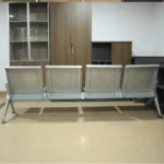 4-Seater Padded Heavy Duty Reception Bench, four-seater waiting room bench, heavy-duty reception seating, padded waiting area bench, commercial reception furniture, durable visitor seating bench, office waiting room furniture, upholstered reception bench, comfortable four-person bench, heavy-duty public seating, modern reception area furniture, professional office waiting bench, cushioned visitor bench, high-capacity reception seating, commercial waiting room bench, durable metal frame reception bench, padded office waiting seats, institutional waiting room furniture, ergonomic visitor seating, long reception bench, four-person padded waiting chair, robust commercial seating solution, premium reception furniture, business lobby seating, office visitor waiting bench, heavy-duty padded seating, comfortable public waiting bench, healthcare reception seating, hospital waiting room bench, clinic visitor seating, airport waiting area bench, school reception furniture, bank waiting room seating, hotel lobby bench, commercial office furniture, durable upholstered bench, reinforced reception seating, multi-person waiting bench, professional visitor seating solution, modern office reception bench, easy-maintenance waiting room furniture, high-strength metal seating frame, padded public waiting seats, spacious reception bench, long-lasting commercial furniture, institutional reception seating, business premises waiting furniture, four-seat lobby bench, heavy-duty upholstered waiting bench, functional reception area seating, high-traffic waiting room furniture, professional commercial seating equipment,Office reception area, corporate reception, business lobby, waiting room, hospital reception, clinic waiting area, medical center reception, dental clinic waiting room, school reception area, university administration office, college waiting area, government office reception, public service center, bank reception, insurance office waiting area, hotel lobby, hotel reception area, airport waiting lounge, railway station waiting area, bus terminal waiting room, shopping mall customer service area, commercial building lobby, corporate headquarters reception, visitor waiting area, customer service department, conference center reception, conference waiting area, conference hall entrance, industrial facility reception, factory administration office, warehouse reception, security screening area, courthouse waiting area, legal office reception, real estate office reception, property management office, apartment building lobby, residential complex reception, church reception area, community center waiting room, salon waiting area, spa reception, restaurant waiting area, showroom reception, office furniture showroom, educational institution reception, public hospital waiting room, private hospital lobby, outpatient department waiting area, laboratory reception, diagnostic center waiting room, Nairobi office reception areas, Nairobi commercial buildings, Kenya corporate premises, Kenyan healthcare facilities, professional workplaces across Kenya, commercial establishments in East Africa.